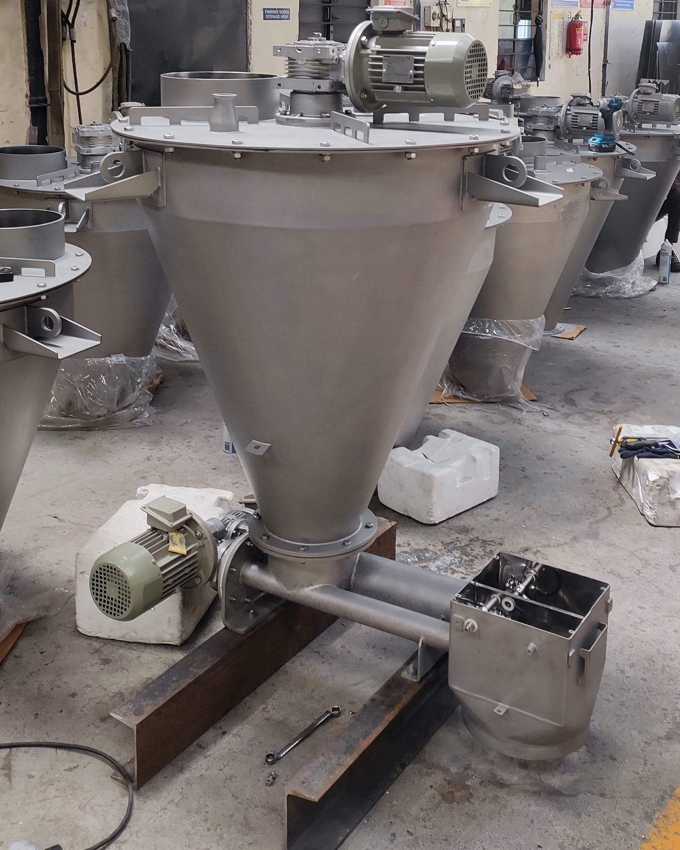 Several loss-in-weight feeders under assembly
